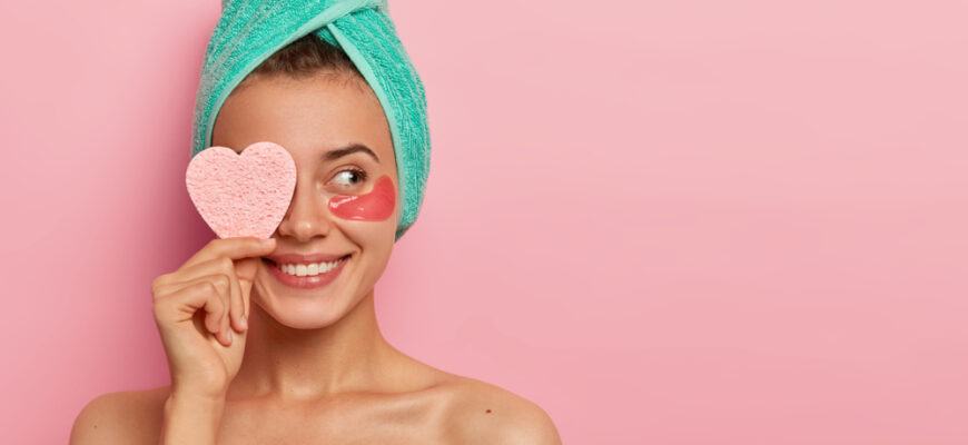 Cheerful,Young,Female,Model,Has,Pleasant,Smile,,Covers,Eye,With